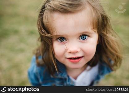 Portrait of young girl, outdoors, close-up