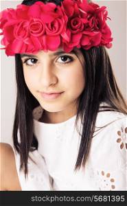 Portrait of young girl wearing flowers headband