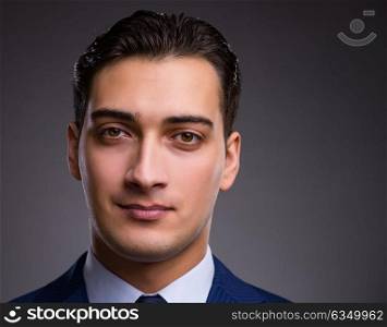 Portrait of young handsome businessman