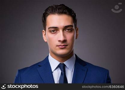 Portrait of young handsome businessman