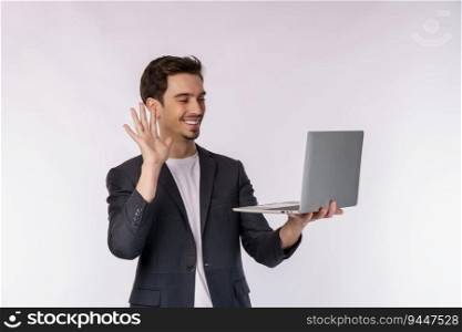 Portrait of young handsome smiling businessman video call via laptop in hands, isolated on white background. Technology and business concept.