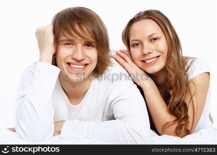 Portrait of young happy couple at home