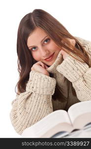 Portrait of young happy woman with book wearing turtleneck on white background