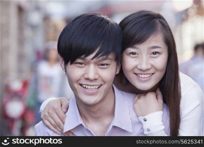 Portrait of Young Heterosexual Couple Smiling in Beijing