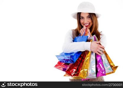 Portrait of Young lady happy with lot of shopping bags on a isolated background