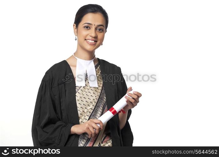 Portrait of young lawyer holding degree isolated over white background