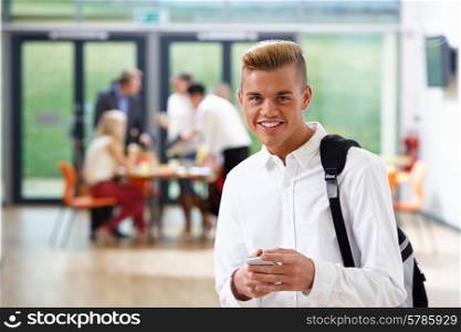 Portrait Of Young Male Student In Classroom