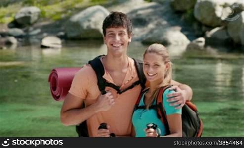 Portrait of young man and woman during excursion in the forest, happy boy and girl hiking and trekking on mountains. Part 12 of 12