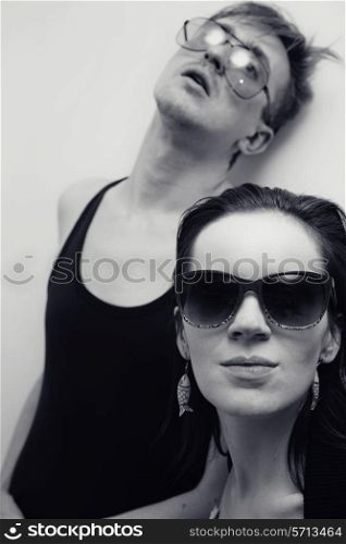 Portrait of Young man and woman in sunglasses