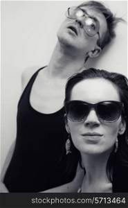 Portrait of Young man and woman in sunglasses