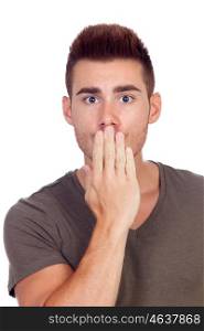 Portrait Of Young Man Covering His Mouth With Hand On White Background