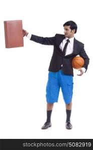 Portrait of young man holding briefcase and basketball