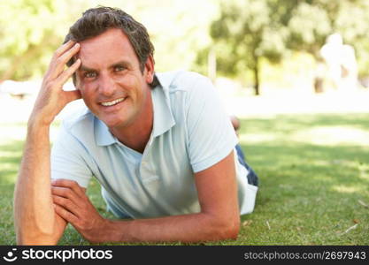 Portrait Of Young Man In Park