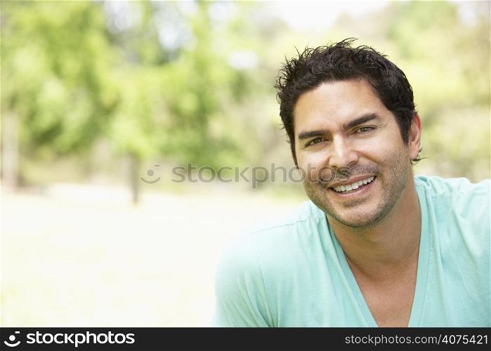 Portrait Of Young Man In Park