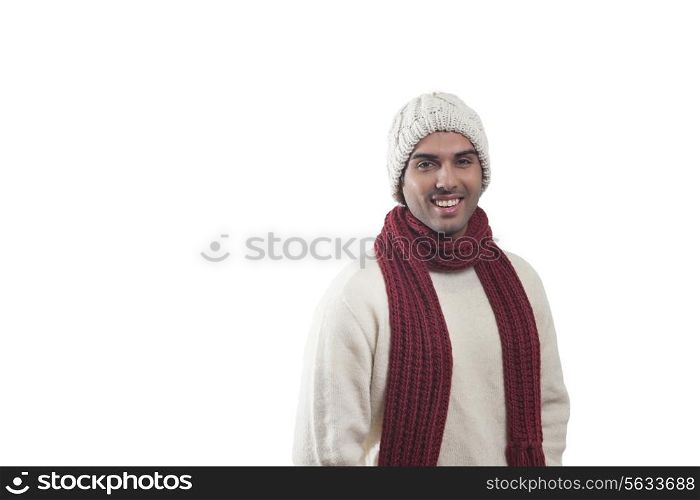 Portrait of young man in warm clothes smiling