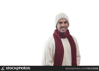 Portrait of young man in warm clothes smiling