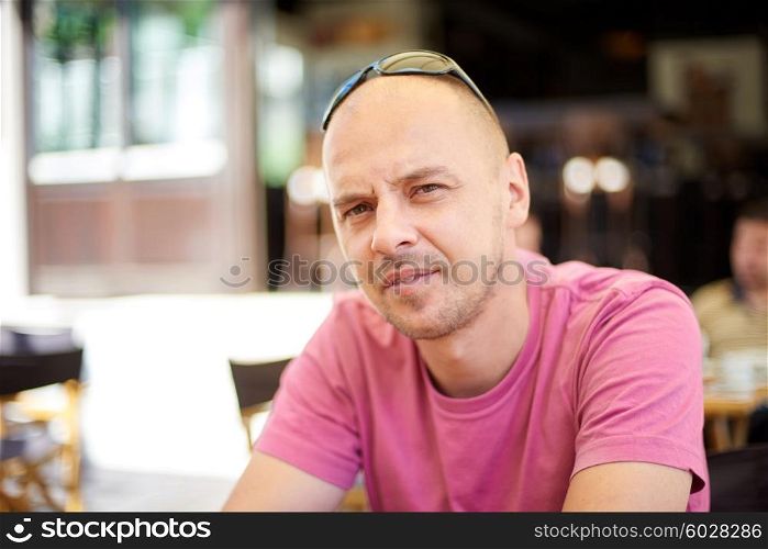 portrait of young man on coffee break at restaurant