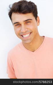 Portrait Of Young Man Standing By Wall