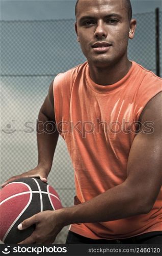 Portrait of young man street basket player