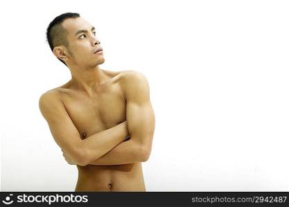Portrait of young man strip to the waist