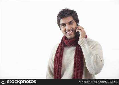 Portrait of young man talking on cell phone