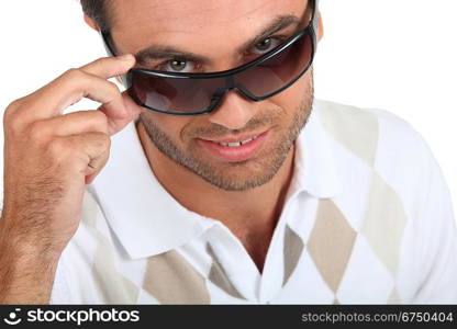 Portrait of young man wearing sunglasses