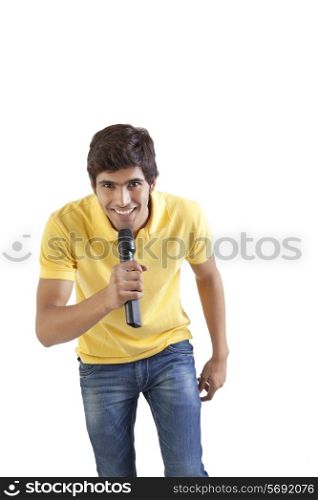 Portrait of young man with a microphone smiling