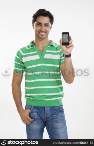 Portrait of young man with a mobile phone