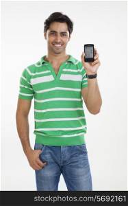 Portrait of young man with a mobile phone