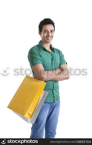 Portrait of young man with a shopping bag