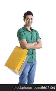 Portrait of young man with a shopping bag