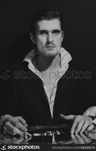 Portrait of young man with cocaine addict