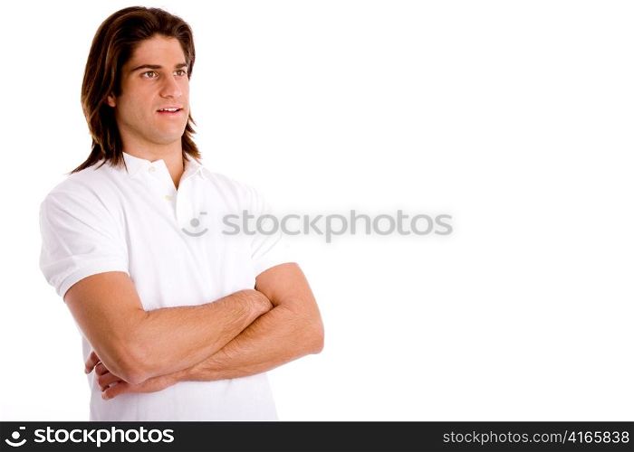 portrait of young man with folded hands on an isolated white background