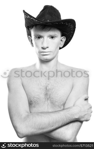 Portrait of young naked man in cowboy hat on white background