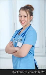 portrait of young nurse in a blue uniform