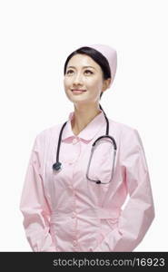 Portrait of young nurse, studio shot, China