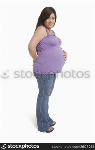 Portrait of young pregnant woman