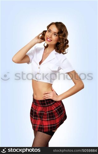 Portrait of young prestty woman dressed in retro style