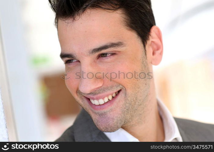 Portrait of young relaxed businessman