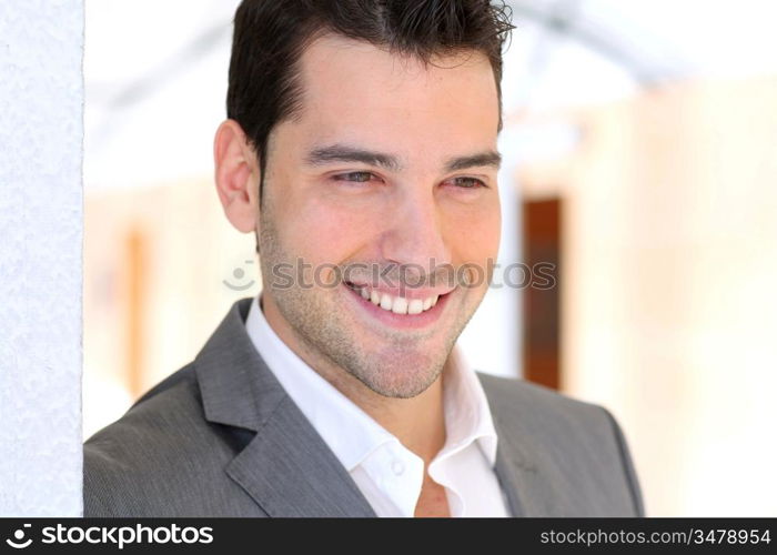 Portrait of young relaxed businessman