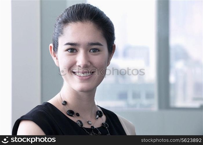 Portrait of young smiling businesswoman