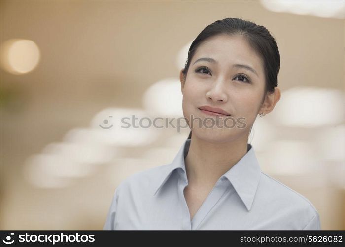 Portrait of young smiling businesswoman, Beijing