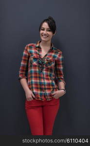 portrait of young startup business woman at modern office, grey chalkboard wall in background