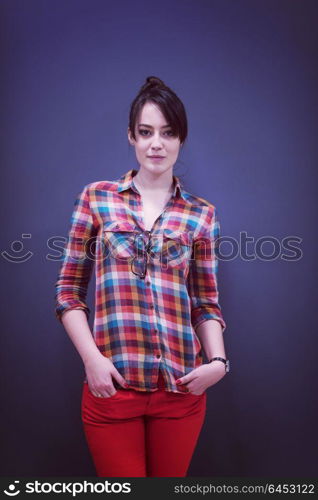 portrait of young startup business woman at modern office, grey chalkboard wall in background