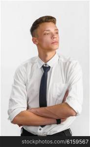 portrait of young stylish businessman on gray background. young stylish businessman