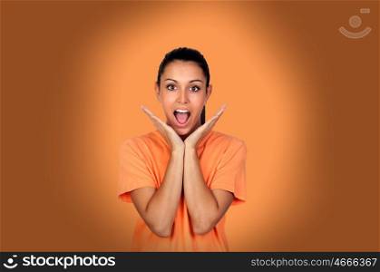 Portrait Of Young Surprised Woman Isolated On Orange Background