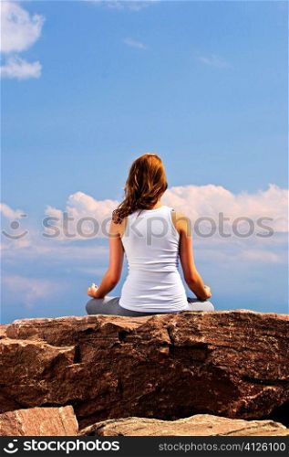 Portrait of young teenage girl doing yoga