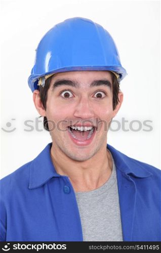 portrait of young tradesman playing the fool