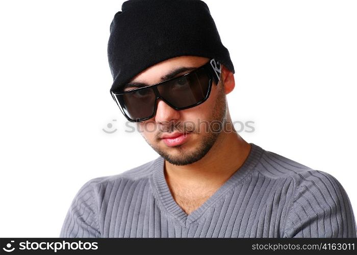 Portrait of young trendy african man posing with attitude