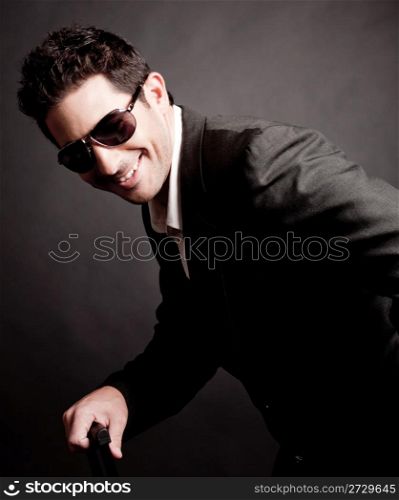 Portrait of young Trendy Business man smiling,indoor studio